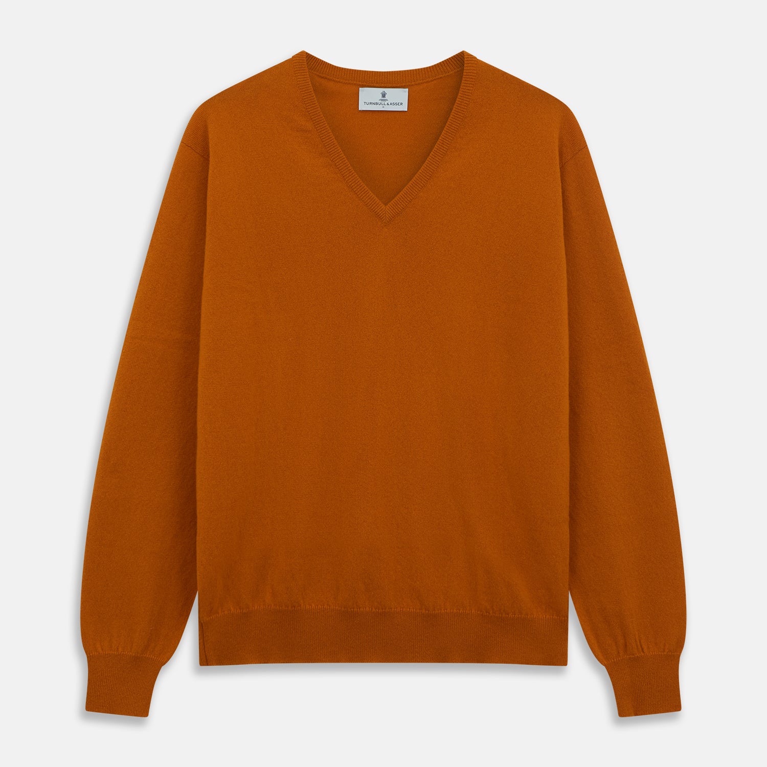View 1 of product The Turnbull & Asser Rust Paden V-Neck Jumper, a pure cashmere sweater with long sleeves and ribbed cuffs and hem, is laid flat on a white background with the label visible at the neck.