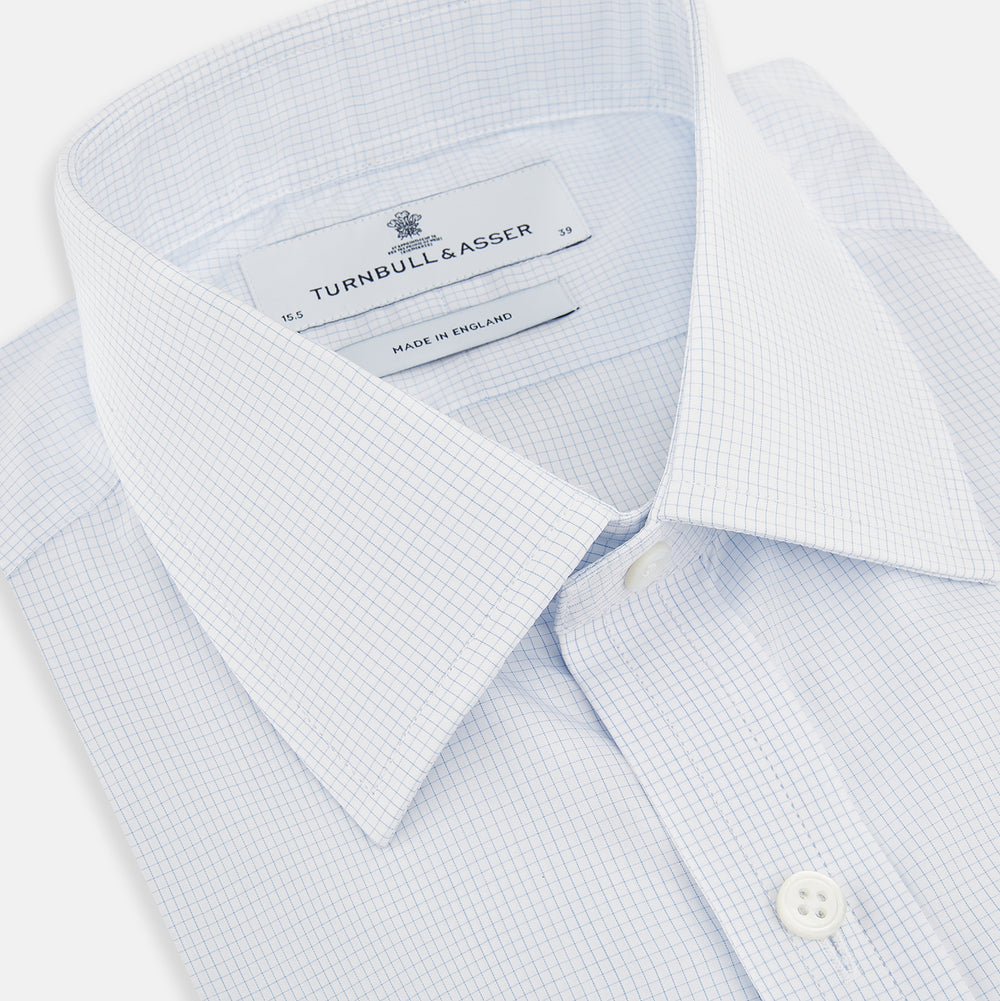 The Turnbull & Asser Blue and White Micro Check Mayfair Shirt features a pointed collar and white buttons, shown flat against a white background.