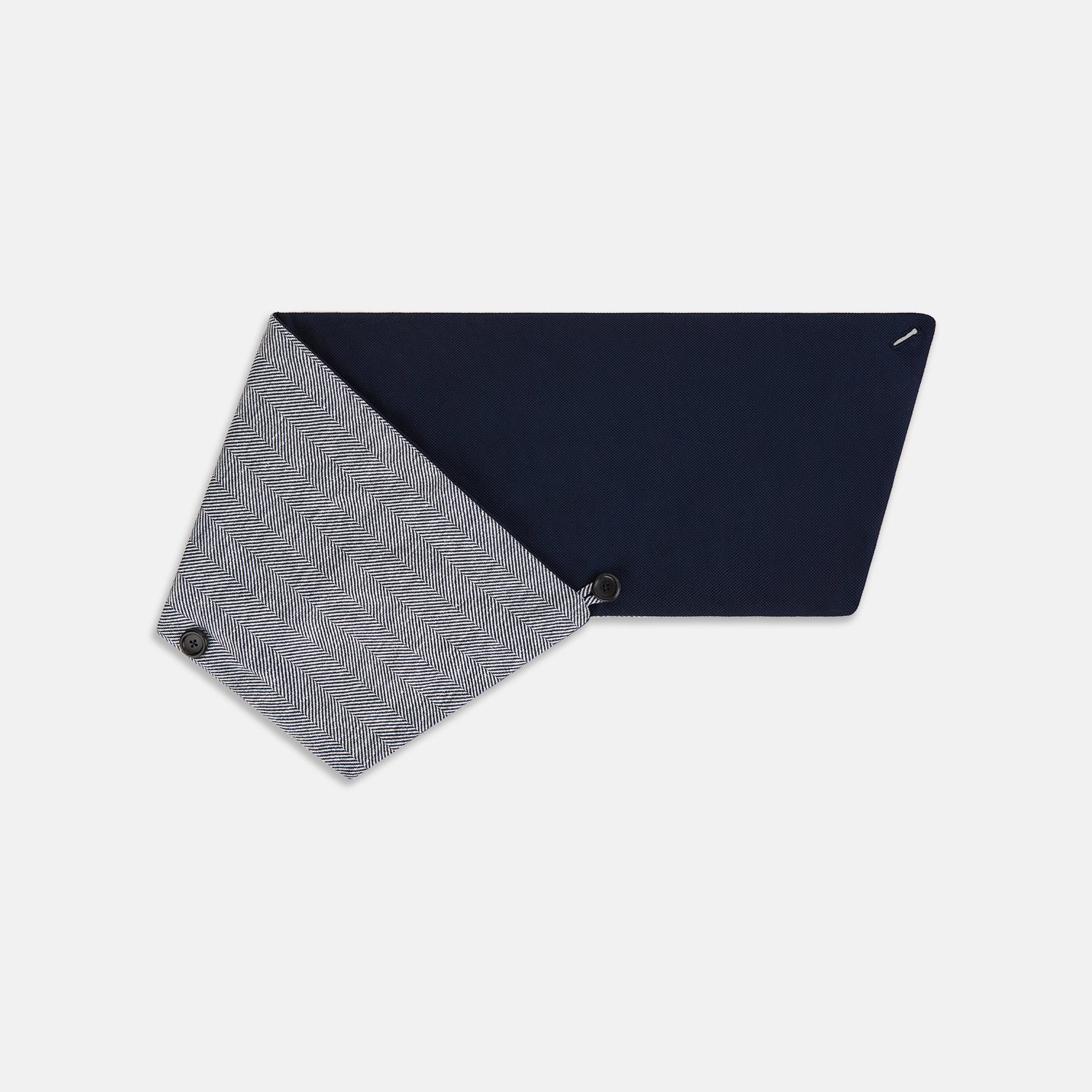Image 3 of product The Turnbull & Asser Navy Herringbone Silk and Linen Neck Warmer features a grey and white pattern, button closure, and dark navy lining—a refined formal accessory for any wardrobe.