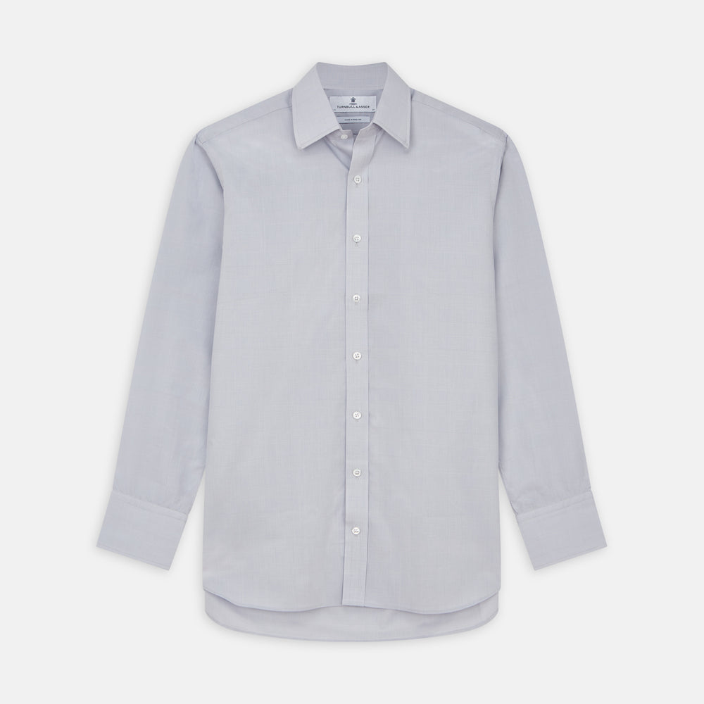 The Turnbull & Asser Faded Blue Block Check Cotton Regular Fit Mayfair Shirt, featuring long sleeves, a classic collar, and white buttons, is neatly laid flat on a white background.