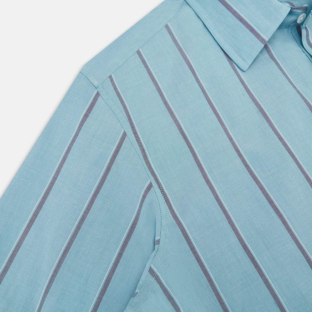 The Cendre Blue Track Stripe Westminster Shirt by Turnbull & Asser features a light blue hue, dark vertical stripes, button-down front, classic collar, and buttoned cuffs—showcasing British craftsmanship.