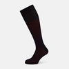 View 1 of product A single Turnbull & Asser Navy/Red Polka Dot Long Sock, crafted from mercerised Egyptian cotton, is displayed against a plain white background.