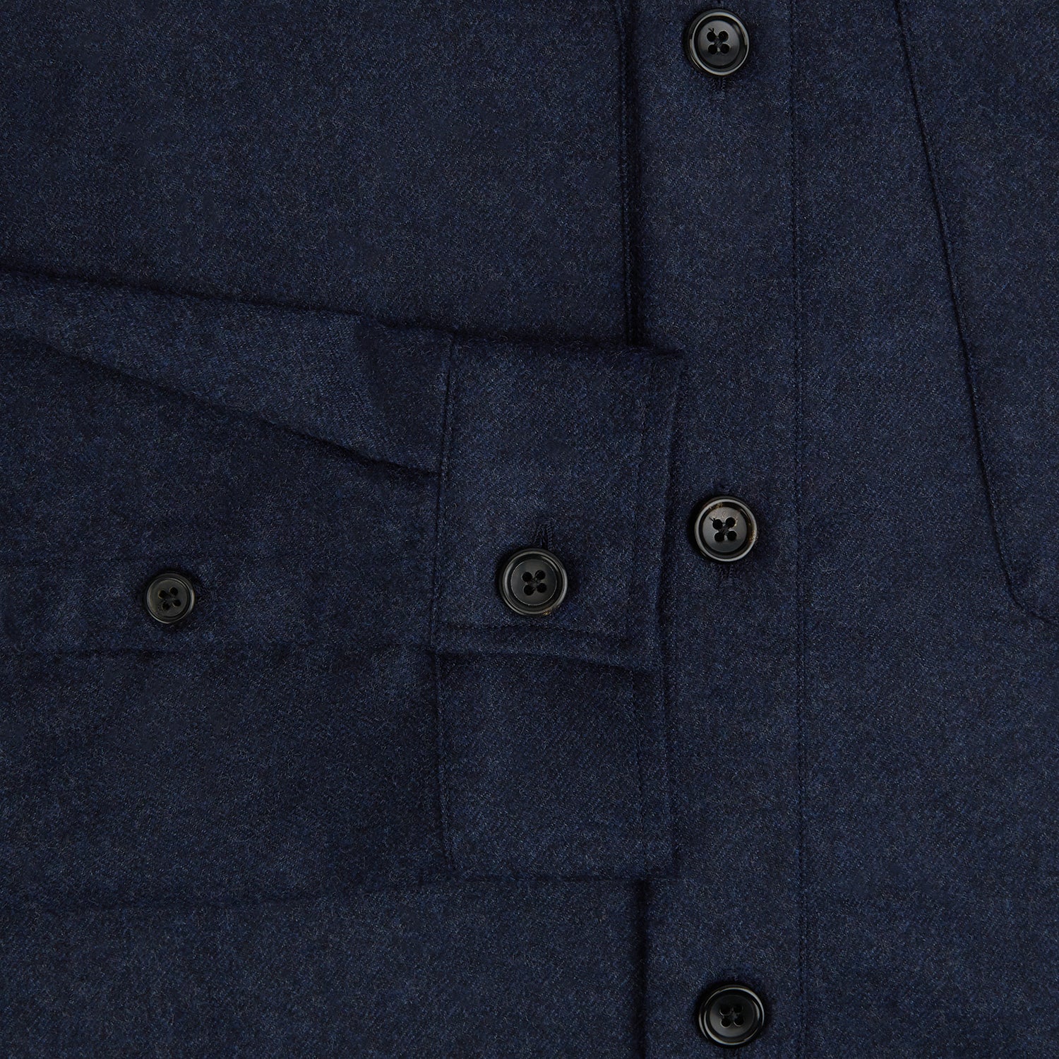 View 4 of product The Turnbull & Asser Mid Blue Highbury Overshirt features long sleeves, a button-up front, collar, and single chest pocket, shown laid flat on a white background.