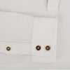 View 4 of product A pale pink luxury cotton rugby polo shirt by Turnbull & Asser, featuring long sleeves and a collar with no buttons, displayed flat on a white background.