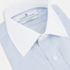 View 2 of product The Turnbull & Asser Sky Blue Hairline Multi Stripe Shirt features a contrast T&A collar and cuffs in white, Mayfair fit, and front buttons, displayed on a plain white background.