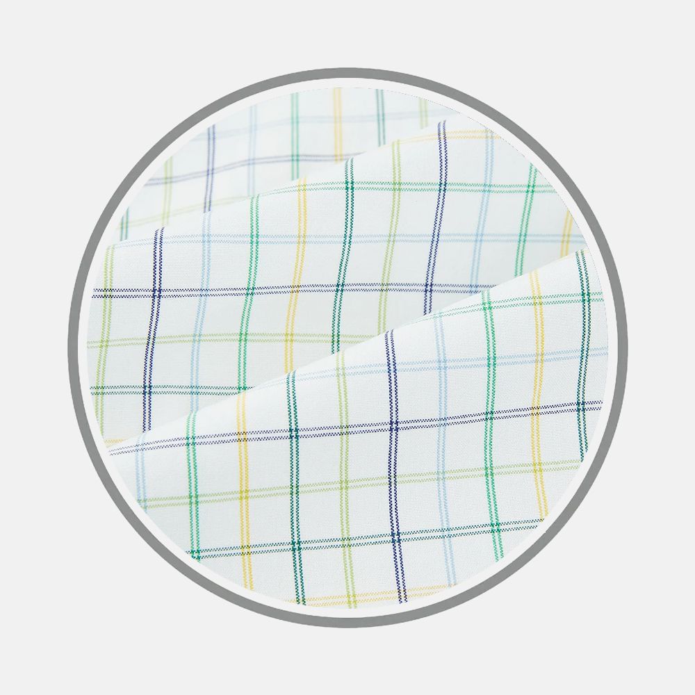 Close-up of Turnbull & Asser's Yellow Multi Double Grid Check Fabric, showcasing white material with intersecting blue, green, and yellow lines in a circular frame on a light background.