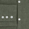 View 4 of product The Sage Linen Westminster Shirt by Turnbull & Asser features long sleeves, a button-up front with white buttons, a pointed Turnbull collar, and buttoned cuffs—crafted in Britain and shown here against a plain white background.