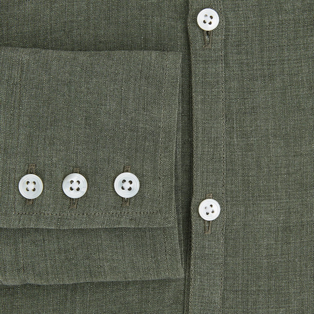 The Sage Linen Westminster Shirt by Turnbull & Asser features long sleeves, a button-up front with white buttons, a pointed Turnbull collar, and buttoned cuffs—crafted in Britain and shown here against a plain white background.