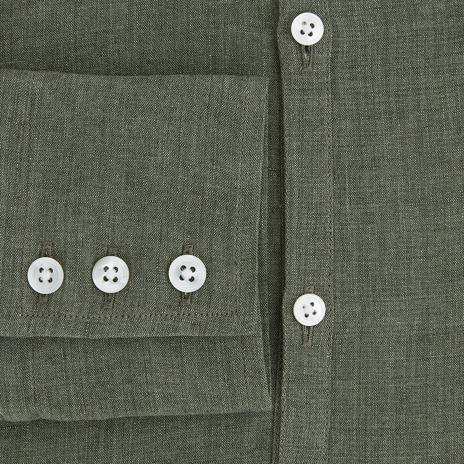 View 4 of product The Sage Linen Westminster Shirt by Turnbull & Asser features long sleeves, a button-up front with white buttons, a pointed Turnbull collar, and buttoned cuffs—crafted in Britain and shown here against a plain white background.