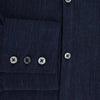 View 4 of product The Navy Linen Westminster Shirt by Turnbull & Asser features a classic collar and buttoned cuffs, exemplifying British craftsmanship. Shown here in long sleeves, the shirt is displayed flat against a white background.