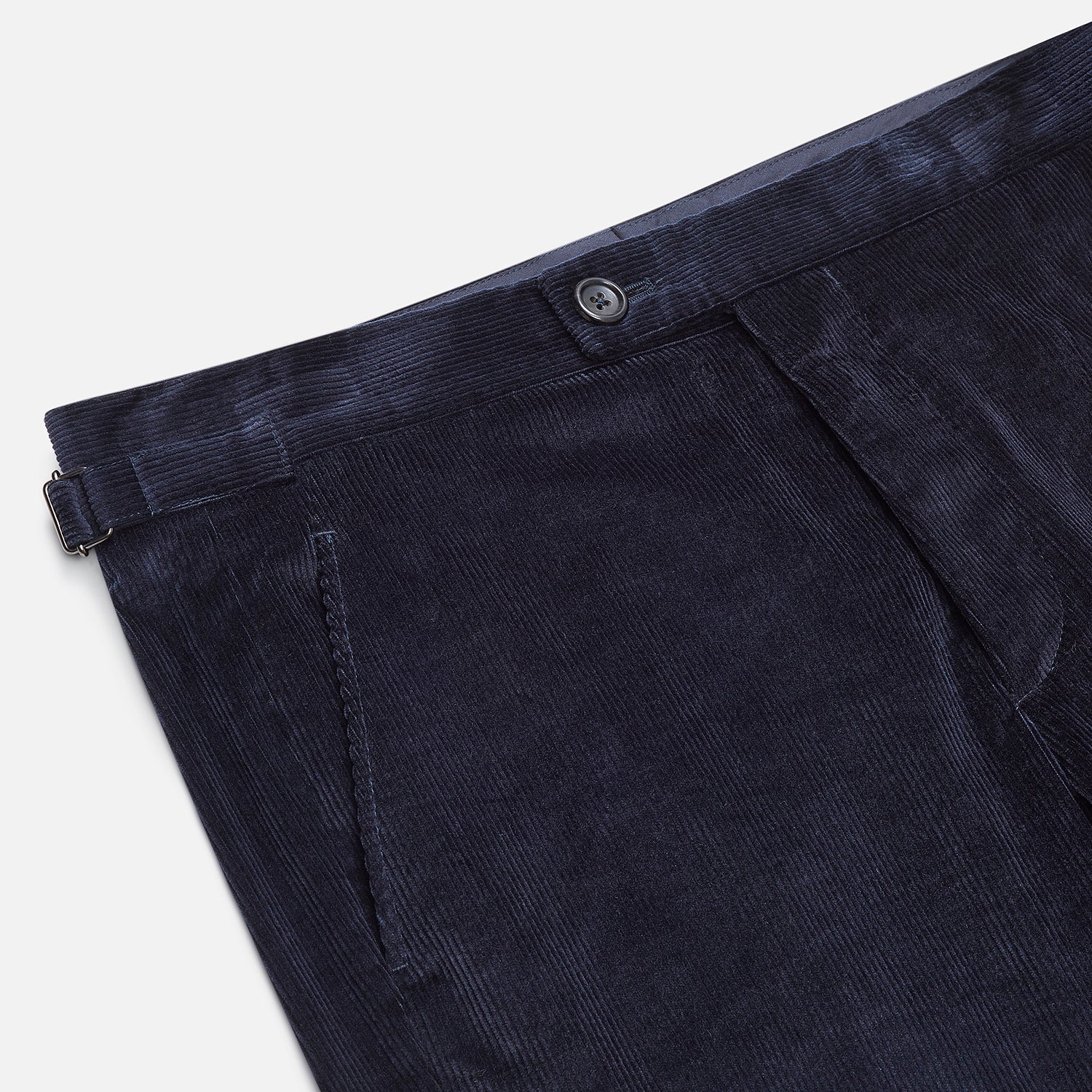 View 2 of product The Turnbull & Asser Navy Corduroy Henry Trousers are tailored fit with a straight-leg cut, made from a wool-cotton blend, and feature front button and zip closure, shown against a plain white background.