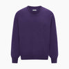 View 5 of product The Turnbull & Asser Purple Cashmere Round Neck Jumper features long sleeves, ribbed cuffs, hem, and collar for an elegant silhouette. This versatile knitwear piece is shown against a white background.