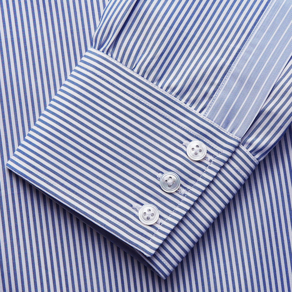 The Turnbull & Asser Blue and White Stripe Cotton RE-PURPOSE Mayfair Shirt, made with recycled fabrics, features long sleeves and a classic collar, and is shown flat against a white background.