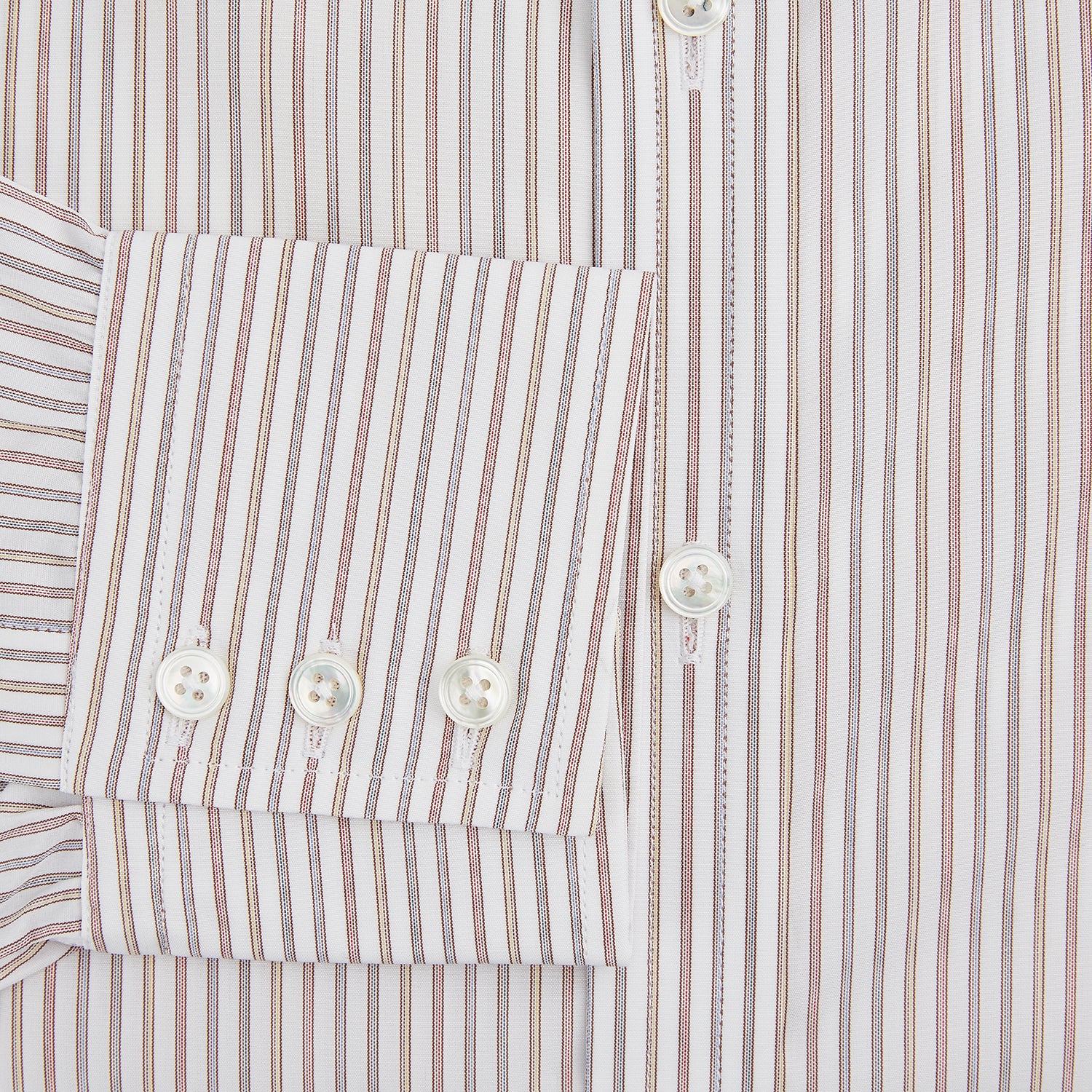 View 4 of product The Red with Multicoloured Music Stripe Mayfair Shirt by Turnbull & Asser is a long-sleeve, button-up shirt with a collar, featuring vibrant multicoloured stripes, inspired by classic British design, neatly laid flat on a plain background.