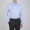 View 4 of product The Turnbull & Asser Light Blue Royal Oxford Cotton Shirt features a button-down collar, 3-button cuffs, and white buttons. Neatly folded with a visible inner label, it’s ideal to pair with a navy suit and displayed on a plain white background.