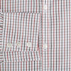 View 4 of product The Turnbull & Asser Red and Midnight Blue Tattersall Check Windsor Shirt features British craftsmanship, shown laid flat with sleeves extended and collar neatly folded.