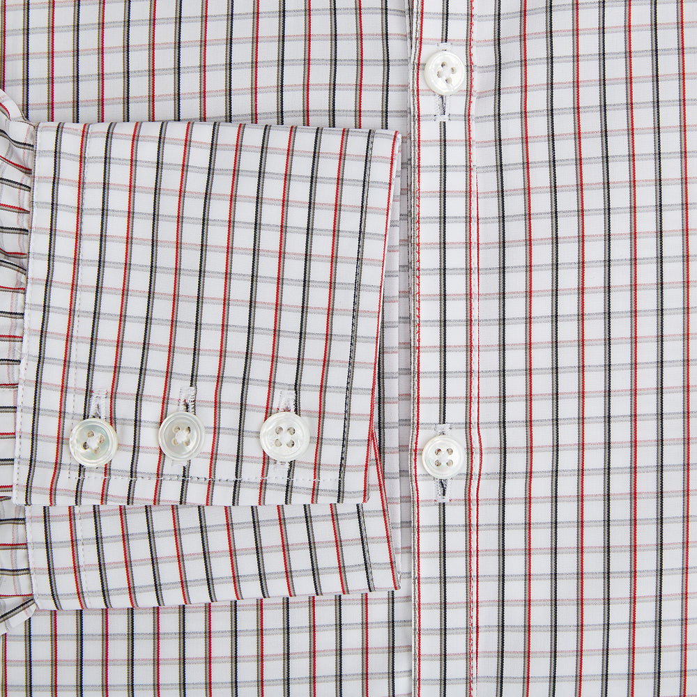 The Turnbull & Asser Red and Midnight Blue Tattersall Check Windsor Shirt features British craftsmanship, shown laid flat with sleeves extended and collar neatly folded.