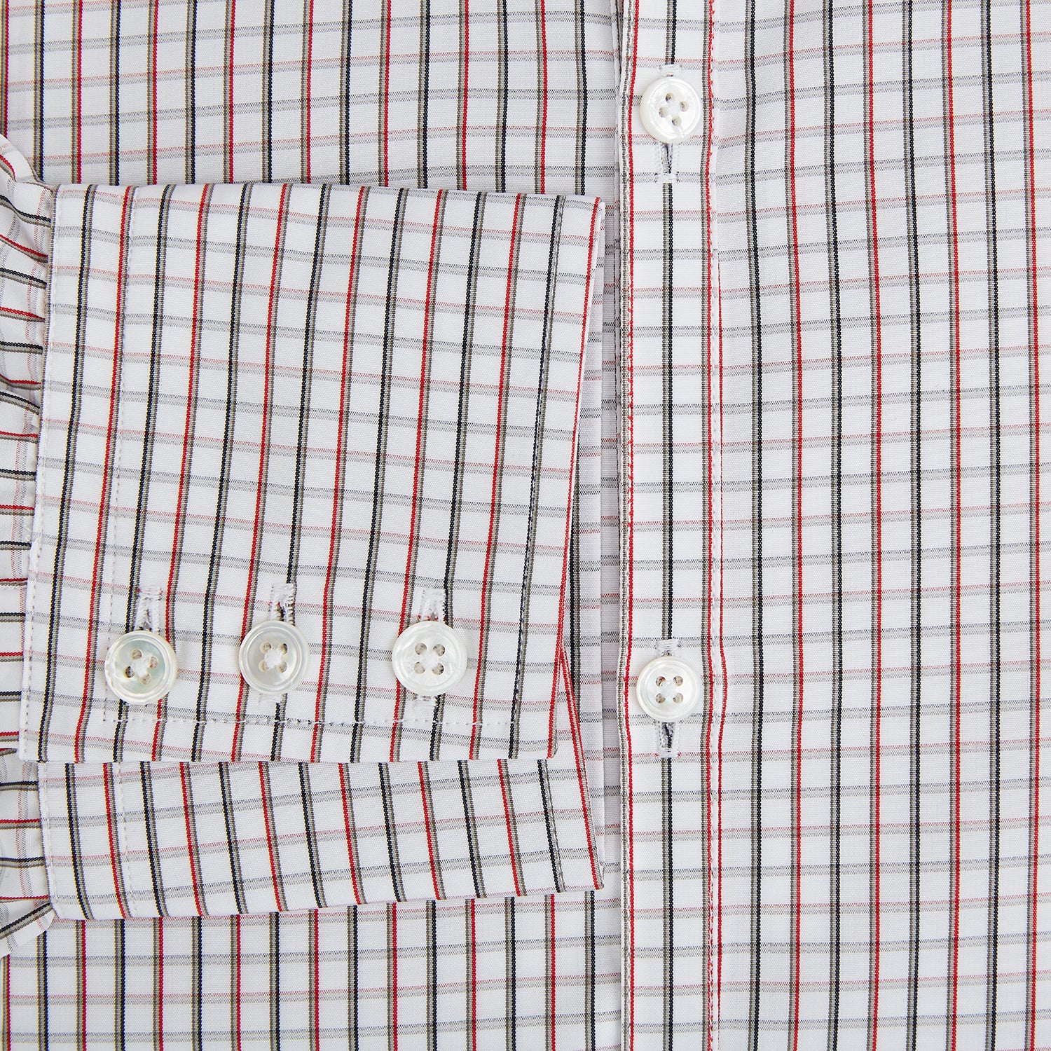View 4 of product The Turnbull & Asser Red and Midnight Blue Tattersall Check Windsor Shirt features British craftsmanship, shown laid flat with sleeves extended and collar neatly folded.