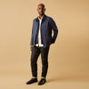 View 6 of product The Turnbull & Asser Cream Weekend Fit Hayne Shirt features a Dorset collar and 1-button cuffs, displayed long-sleeved and laid flat on a white background.