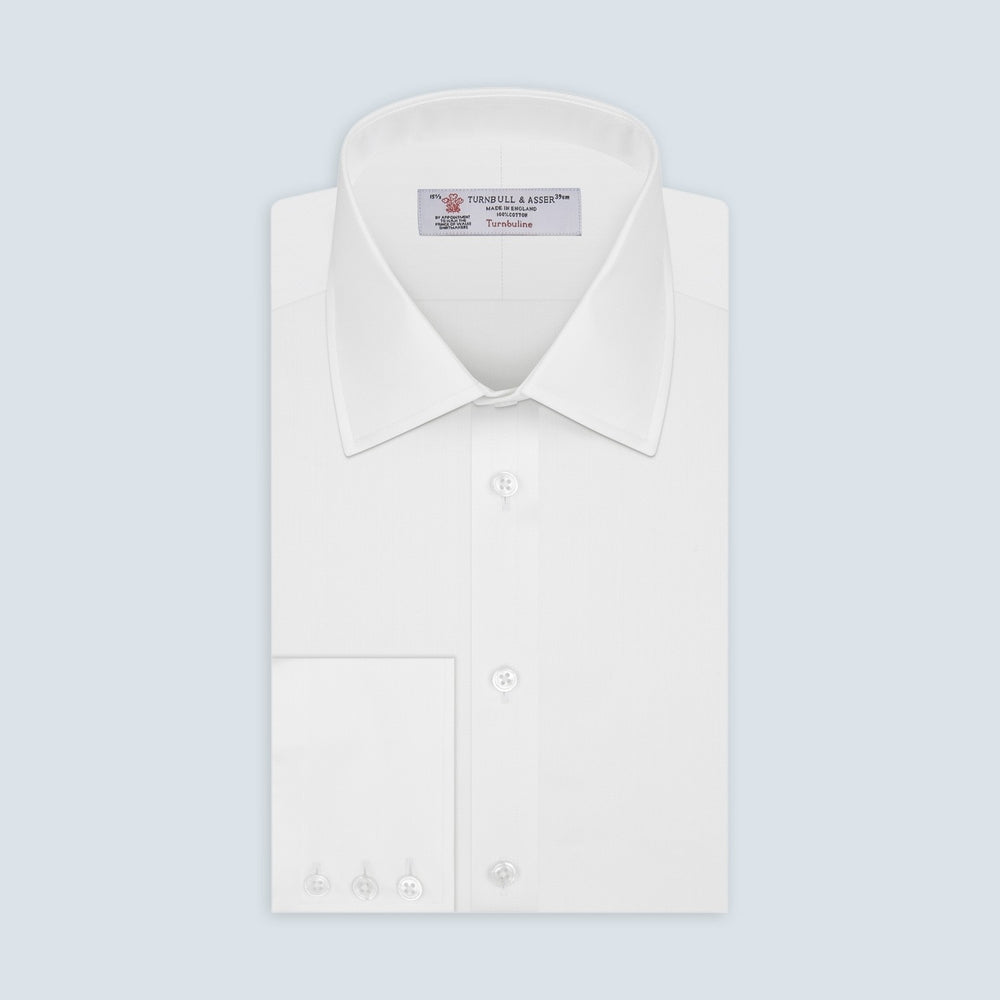 A circular area of Turnbull & Asser's White Herringbone Cotton Fabric, outlined with a thick gray border, appears against a plain light gray background.