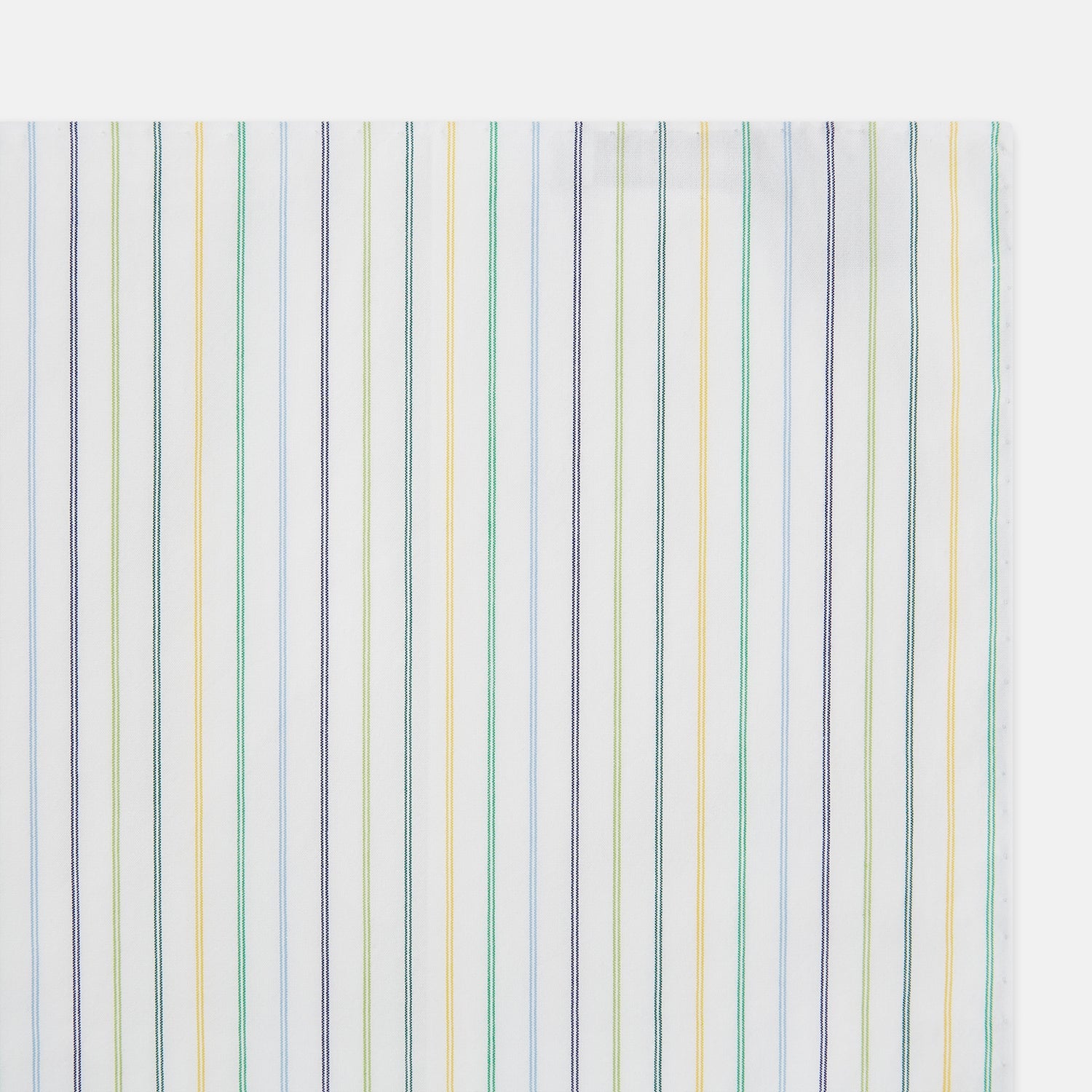 View 1 of product The Turnbull & Asser Yellow Multi Double Pinstripe Hand-Rolled Handkerchief features white fabric with thin blue, green, yellow, and gray stripes. Meticulously hand-rolled edges showcase the superior English craftsmanship.