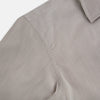 View 6 of product The Turnbull & Asser Brown Micro Graph Check Westminster shirt features long sleeves, a pointed collar, and buttoned cuffs—showcasing British craftsmanship and displayed flat on a white background.