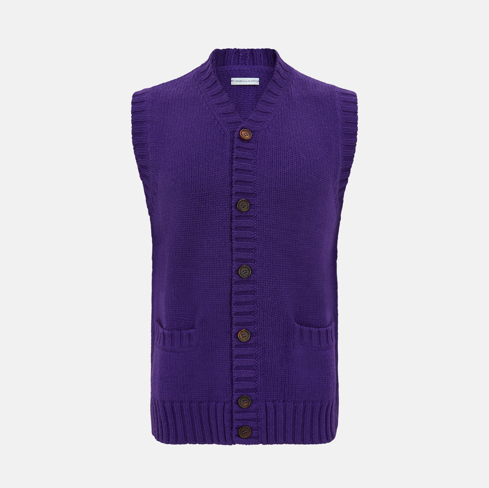 The Turnbull & Asser Purple Merino V-Neck Sleeveless Cardigan features a ribbed collar, button-down front, and two pockets—a refined light layer for gentlemen—shown on a plain white background.