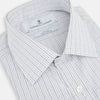 View 2 of product The Turnbull & Asser Pale Blue and Grey Grid Check Mayfair Shirt features long sleeves, a pointed collar, and buttoned cuffs. Crafted from Italian cotton, it displays a subtle grid pattern on a plain white background.