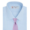 View 4 of product The Turnbull & Asser Light Blue Bengal Stripe Shirt features a classic T&A collar, double cuffs, and white buttons. Made from cotton with blue and white stripes, it's neatly displayed against a plain white background.