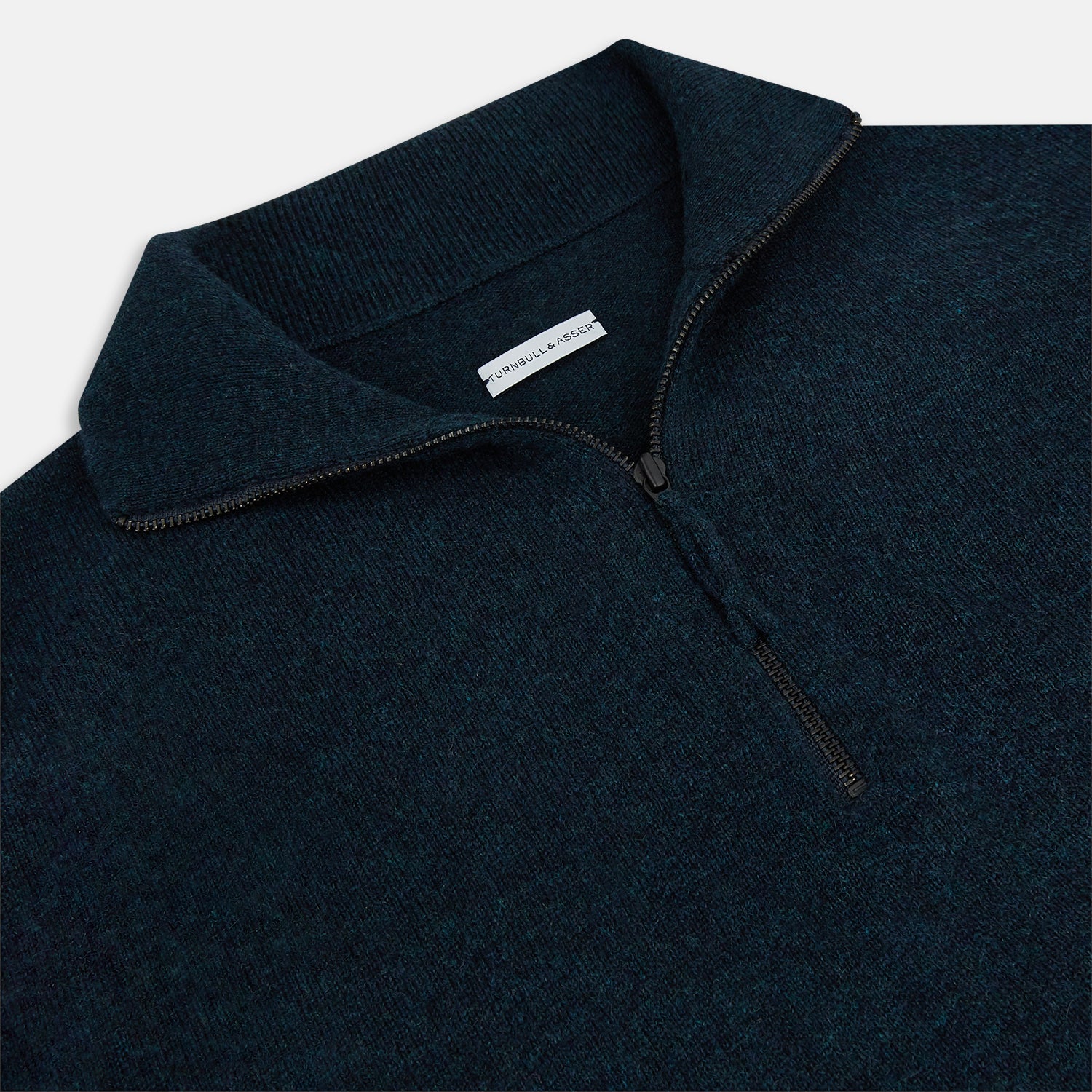 View 2 of product A dark green melange cashmere half-zip jumper by Turnbull & Asser, featuring a long-sleeve, mock neck design with a simple, classic look and no visible patterns or logos, displayed against a plain white background.
