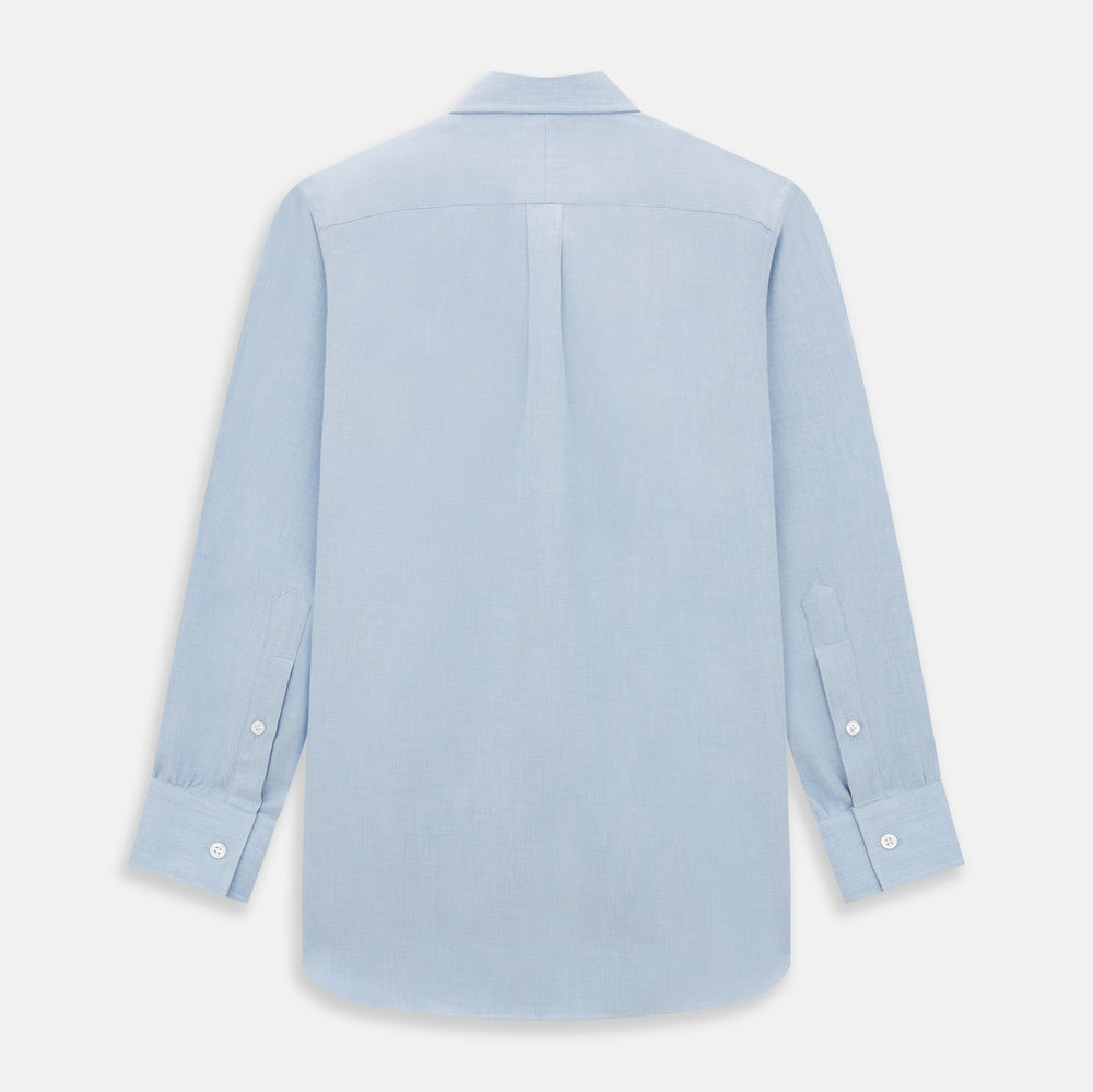 The Turnbull & Asser Pale Blue Cotton Cashmere Derby Collar Richmond Shirt features a soft cotton-cashmere blend, derby collar, white buttons, left chest pocket, and buttoned cuffs, shown laid flat on a white background.