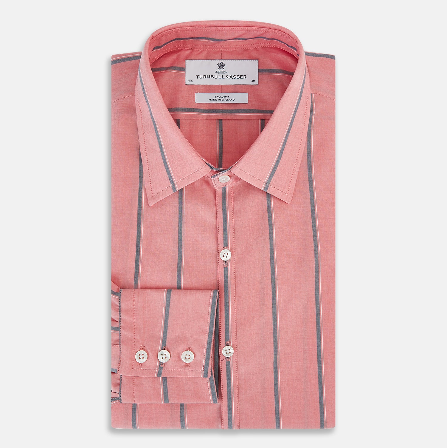 Image 5 of product The Coral Pink Track Stripe Westminster Shirt by Turnbull & Asser features vertical navy and white stripes, a tailored fit, pointed collar, and buttoned cuffs—is displayed laid flat on a white background.