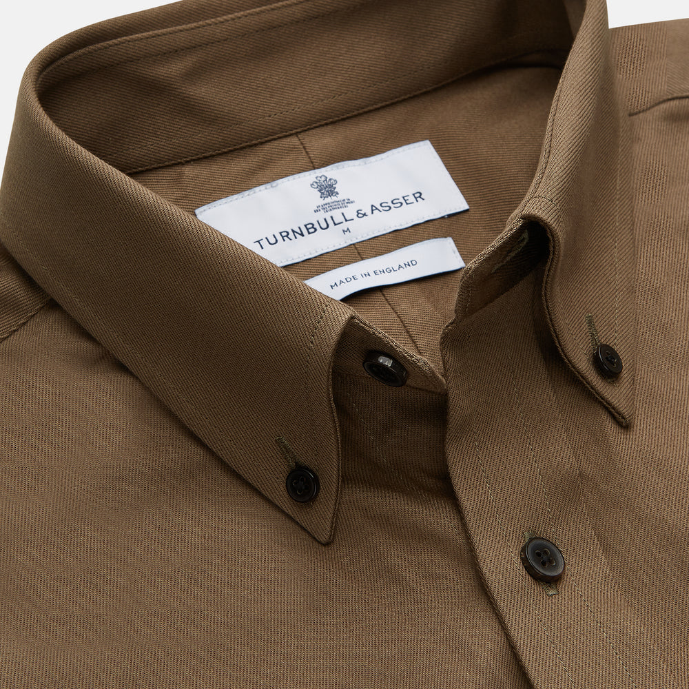 The Turnbull & Asser Khaki Weekend Fit Hayne Shirt features a Dorset collar and 1-button cuffs. Displayed on a plain white background.