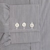 View 4 of product The Turnbull & Asser Navy Fine Stripe Mayfair Shirt, a long-sleeve, button-up with a classic collar, features fine navy stripes and white buttons, shown laid flat on a white background.