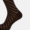 View 4 of product A single Turnbull & Asser Dark Chocolate/cream Diagonal Striped Long Sock, knee-high, is displayed against a plain white background.