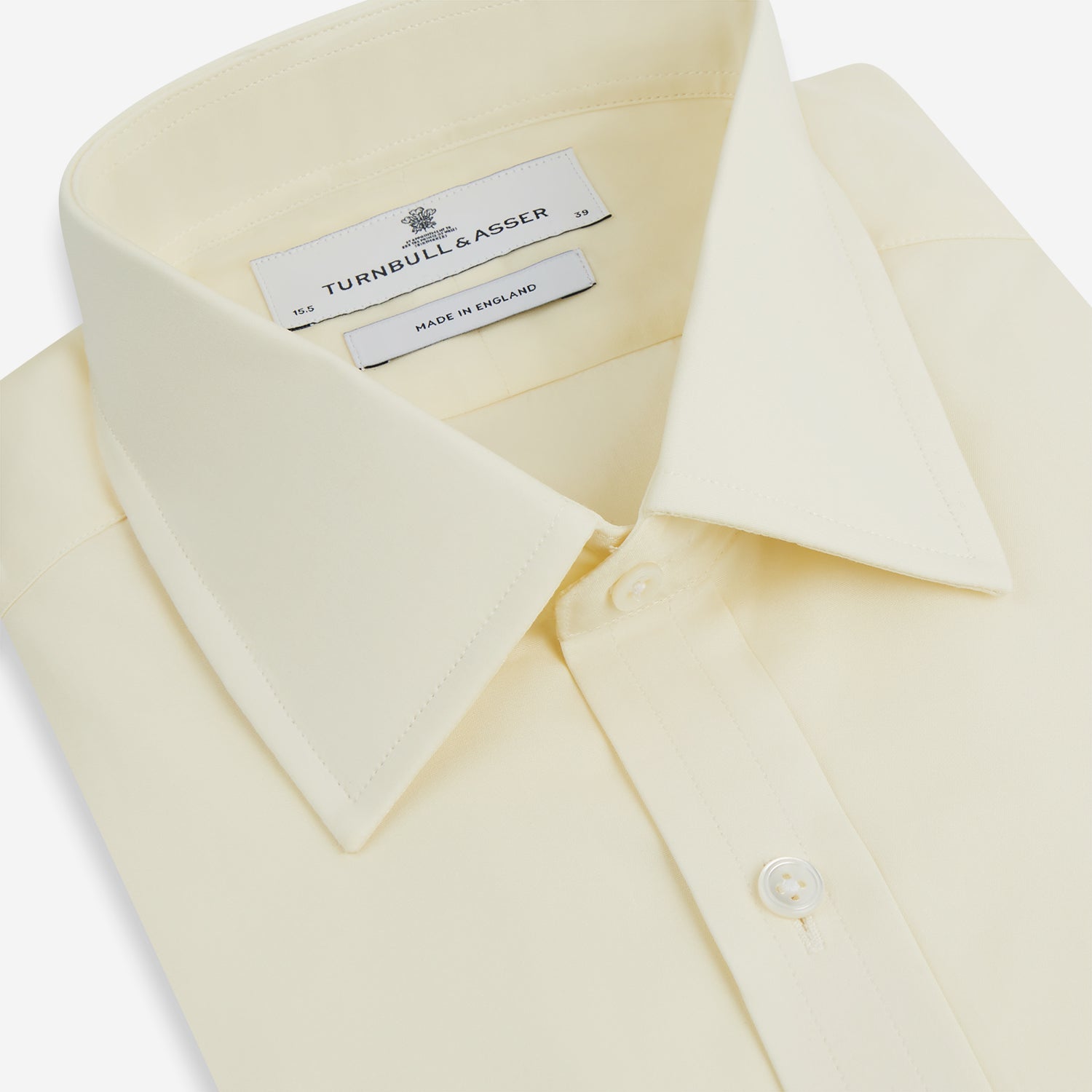 View 2 of product The Cream Cotton Shirt with T&A Collar and Double Cuffs by Turnbull & Asser is shown laid flat on a white background.