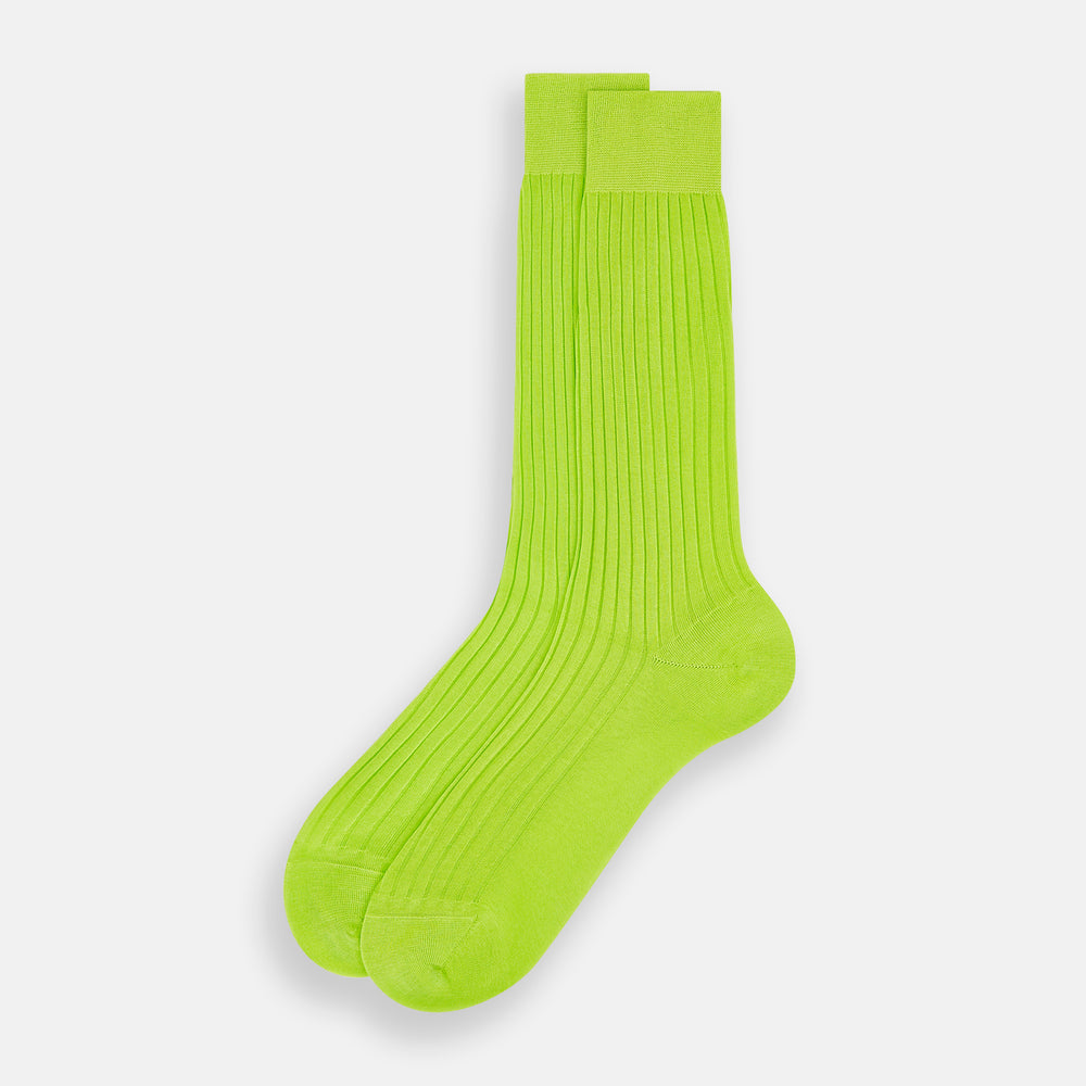 The Turnbull & Asser Lime Mid-Length Sock is crafted from soft mercerised cotton with a ribbed texture and shown against a plain light gray background.