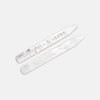 View 1 of product Two Turnbull & Asser Mother-of-Pearl Collar Stays, one engraved with the brand name, are displayed side by side on a plain light background.