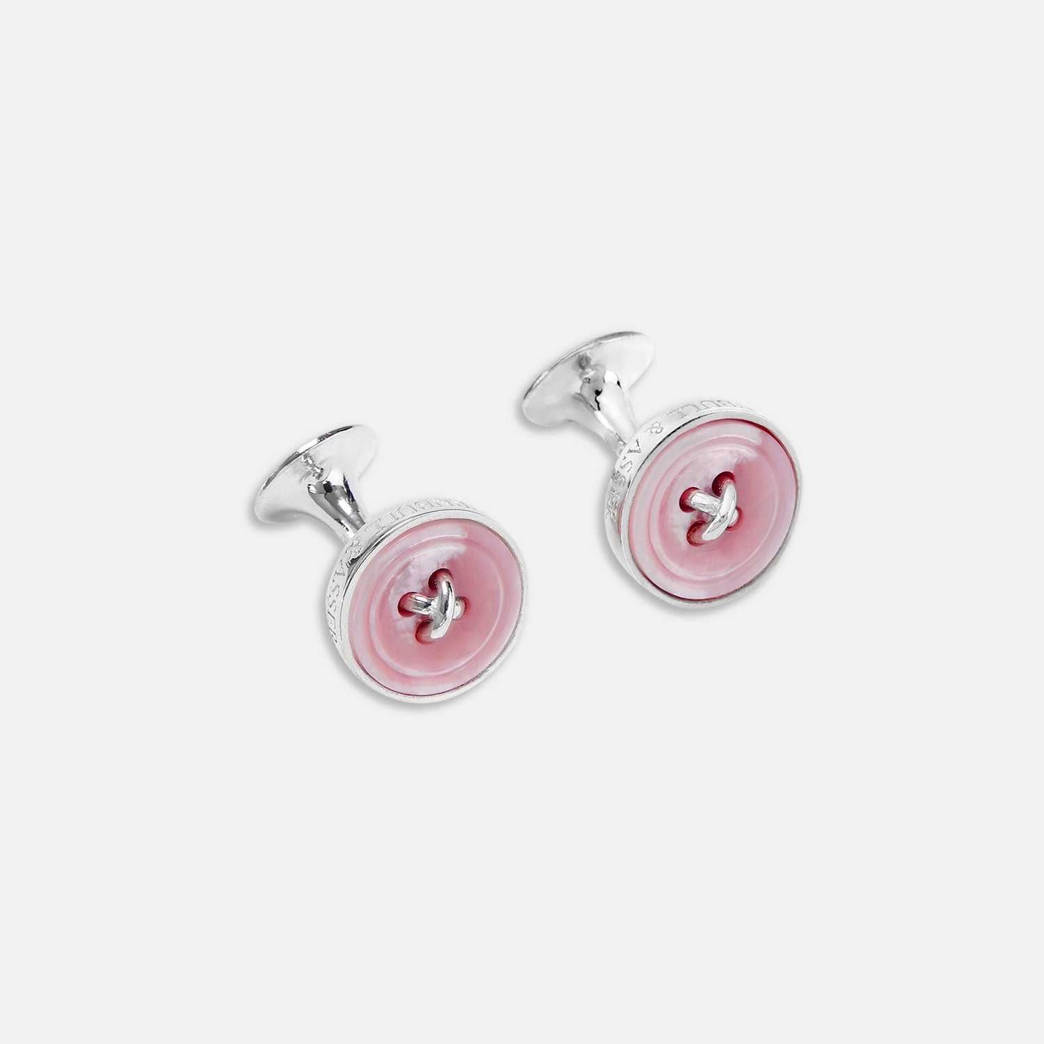 View 1 of product Turnbull & Asser Pink Sterling Silver Mother-of-Pearl Button Cufflinks feature round, pink, button-shaped faces with four central holes, shown against a plain white background.