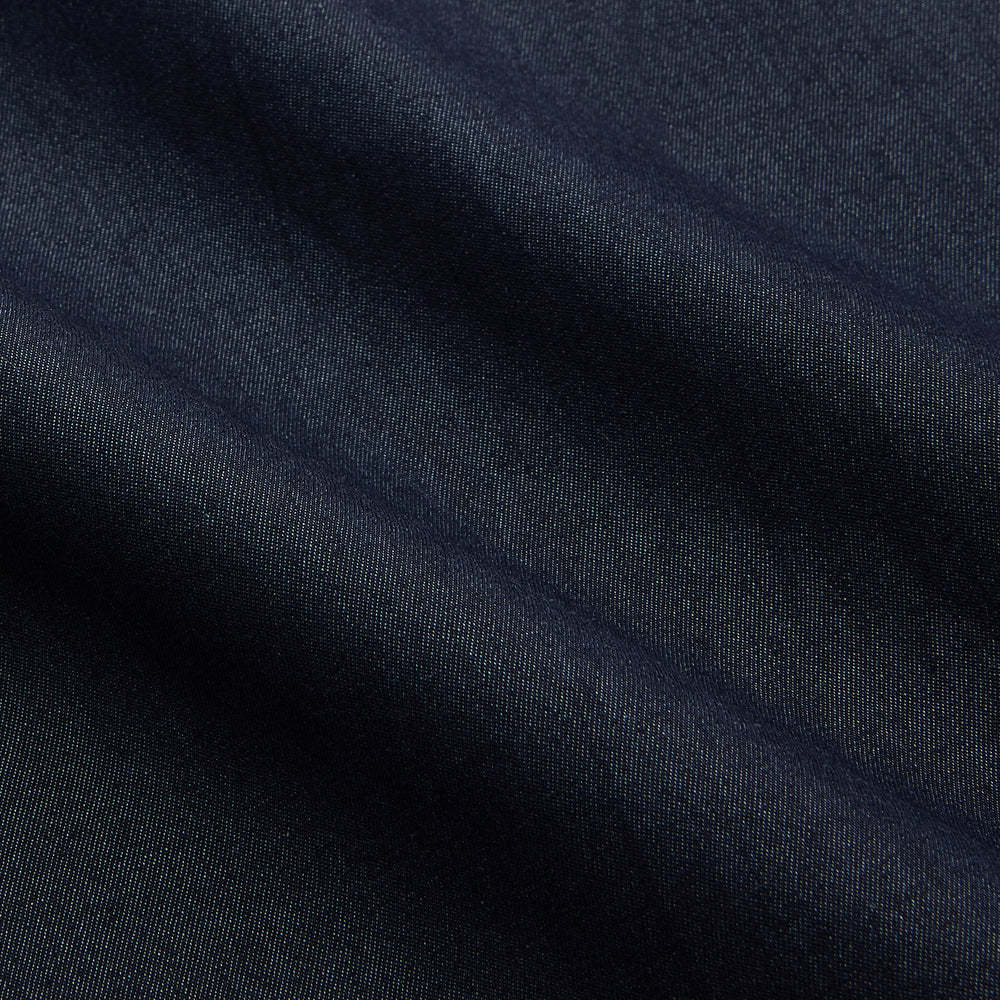 The Turnbull & Asser Navy Weekend Fit Larkin Shirt features a Dorset collar, long sleeves with 3-button cuffs, two chest pockets, and white snaps, shown laid flat against a white background.
