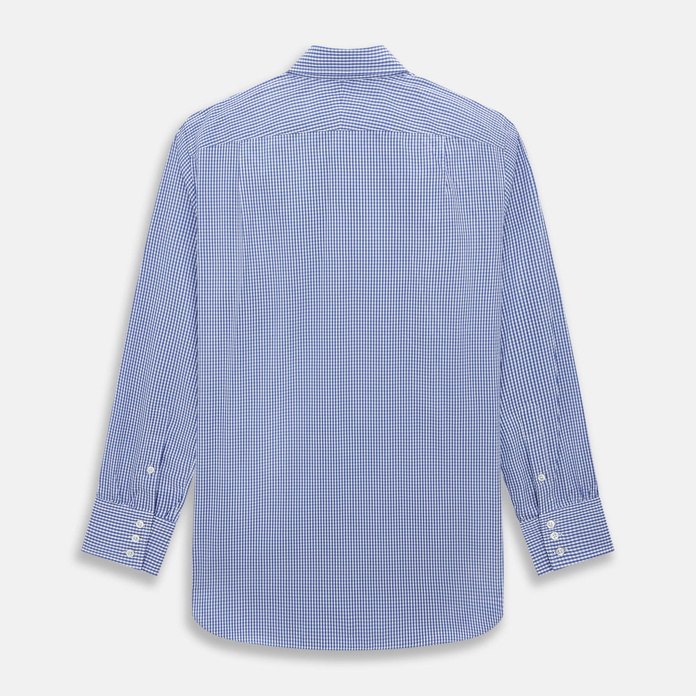 The Turnbull & Asser Blue Grid Check Belgravia Shirt, made from pure cotton with long sleeves, a spread collar, buttoned cuffs, and a blue-and-white check pattern, is laid flat on a white background.