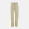 View 1 of product Turnbull & Asser's Taupe Linen Henry Trousers, made from a linen-cotton blend, feature a straight-leg cut, button and zip closure, belt loops, and adjustable waist tabs—shown against a plain white background.