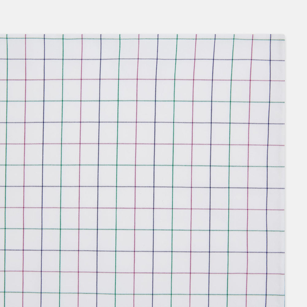 The Turnbull & Asser Hand Rolled Pink and Green Grid Check Handkerchief is a refined accessory, featuring a pink and green grid pattern—perfect for subtly enhancing any gentleman’s outfit.
