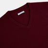 View 2 of product The Turnbull & Asser Burgundy Cashmere V-neck Jumper is shown on a white background.