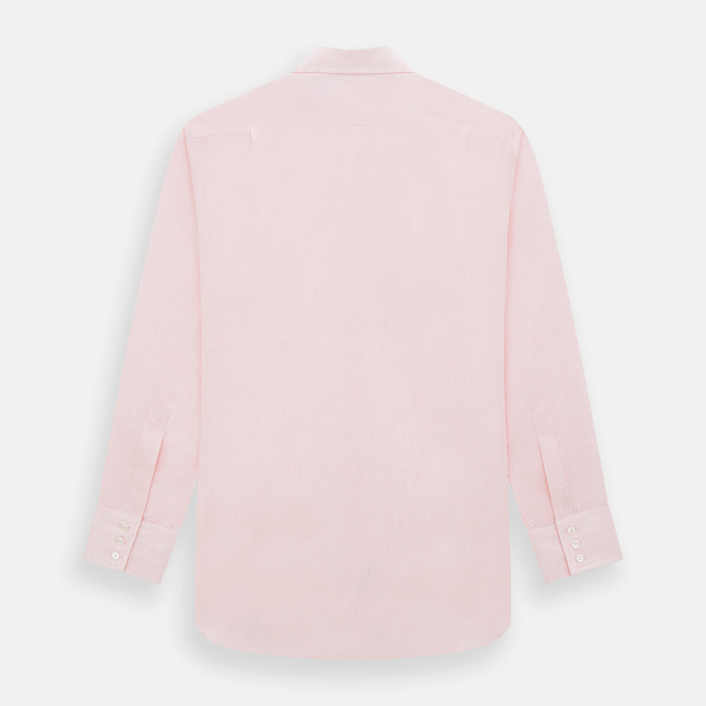 The Turnbull & Asser Pale Pink Linen Mayfair Shirt features a classic, formal style with long sleeves, a collar, and white buttons. Shown laid flat on a white background.
