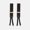 View 4 of product Turnbull & Asser Black Adjustable Formal Braces featuring leather ends and beige metal adjusters, made in England, shown on a white background.