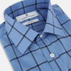 View 2 of product The Turnbull & Asser Colony Blue Grid Check Mayfair Shirt is a light blue, long-sleeve button-up with a collar and evenly spaced dark blue grid lines.