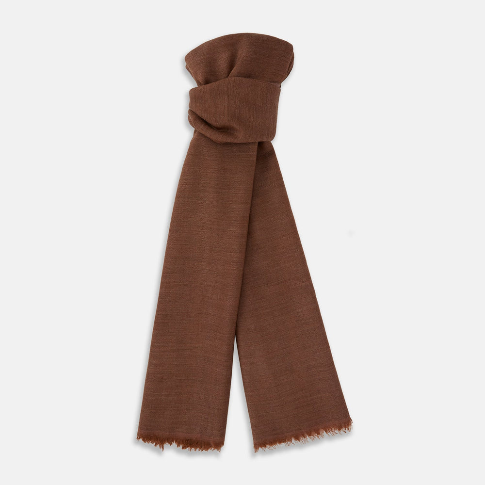 The Turnbull & Asser Brown Cashmere Scarf is ultra-soft with a smooth texture, short frayed edges, and is tied in a simple knot. Displayed against a plain white background.