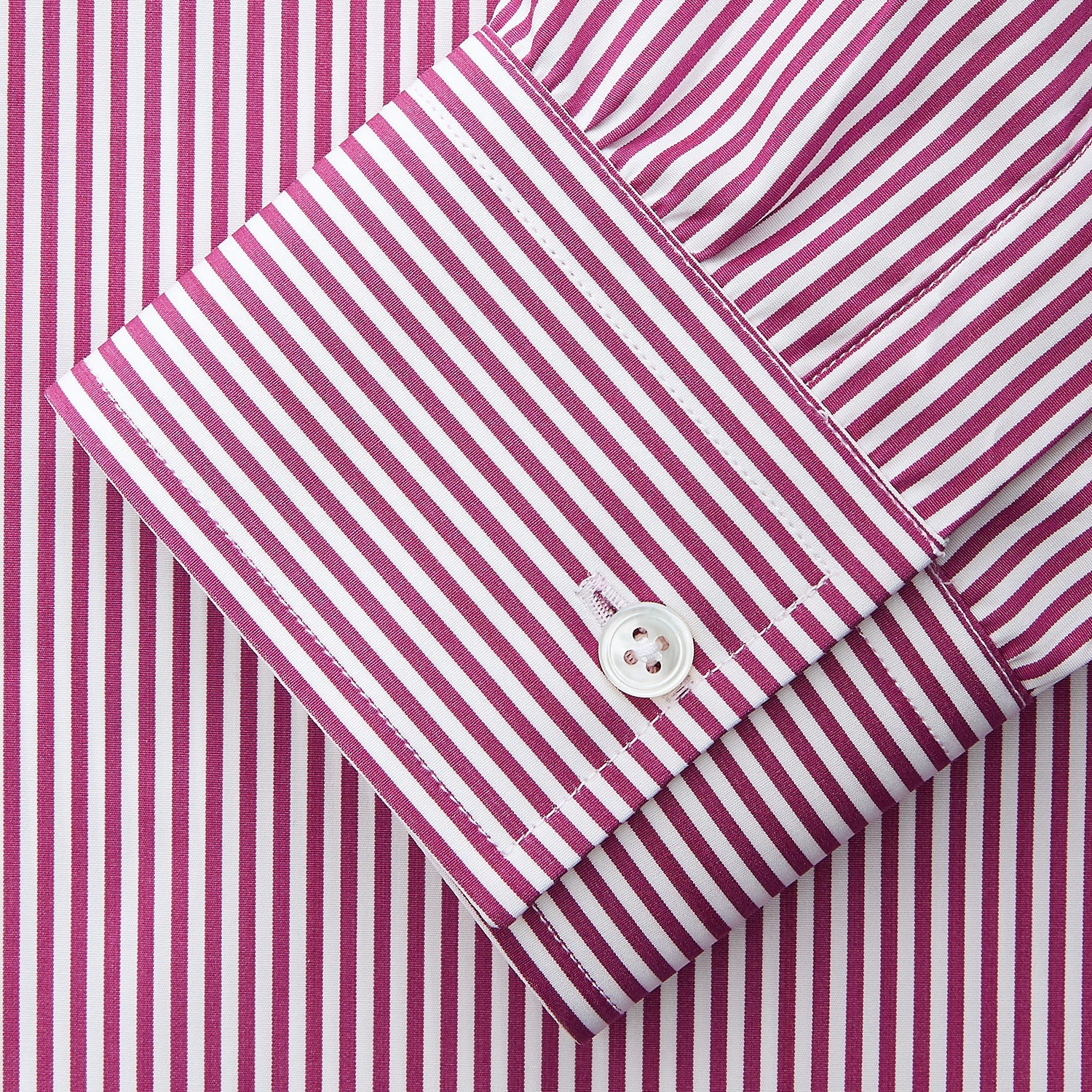 View 5 of product The Turnbull & Asser Purple & White Stripe Weekend Fit Shirt features a Derby collar, chest pocket, and 1-button cuffs—ideal for casual weekends.