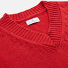 View 4 of product The Turnbull & Asser Raspberry Red Cashmere Edwards V-Neck Sweater features long sleeves, ribbed cuffs and hem, and is shown laid flat on a white background.